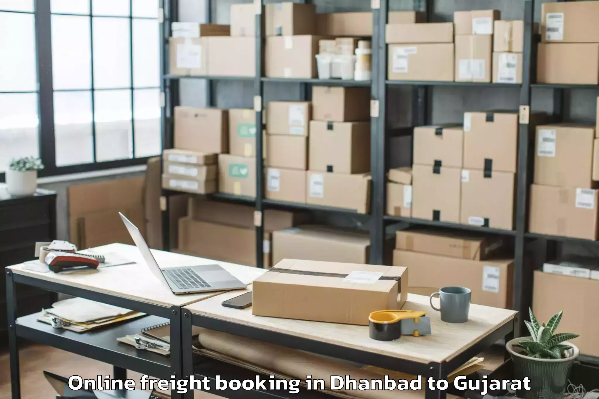 Trusted Dhanbad to Gandhinagar Online Freight Booking